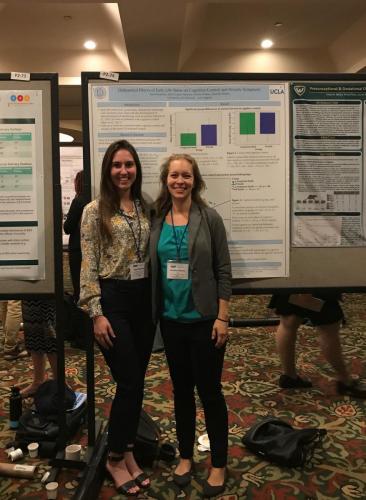Dr. Silvers with Yael at her poster presentation at ISDP